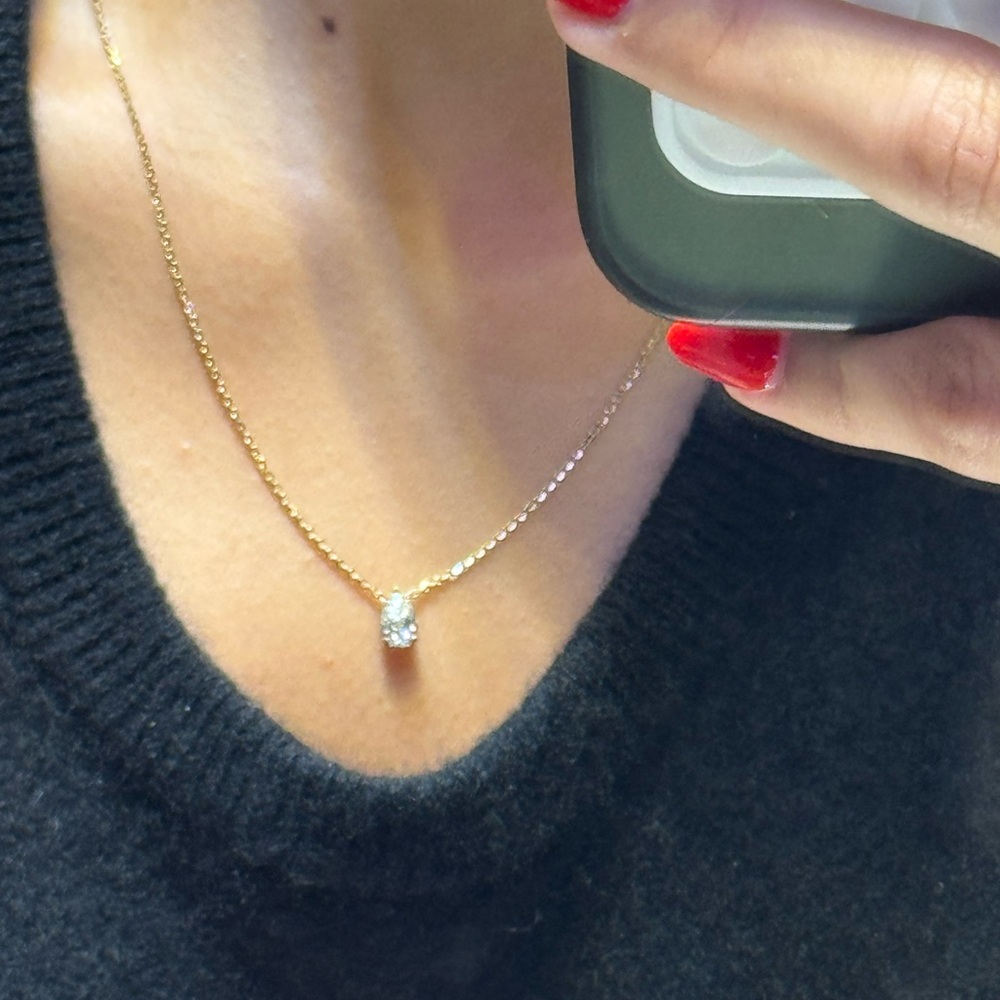 Elegant Gold Necklace with Silver Pendant